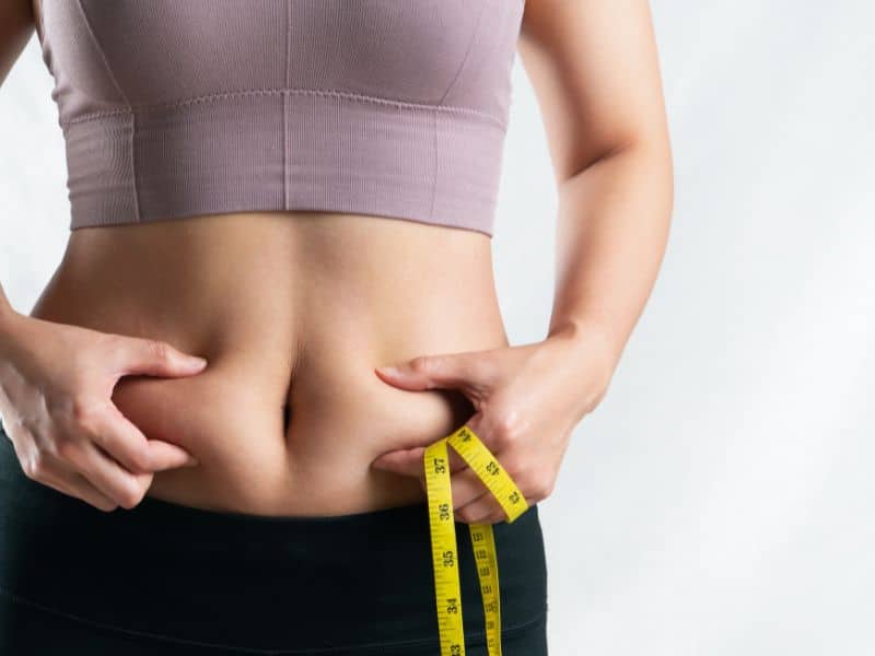 who is a good candidate for a mini tummy tuck 